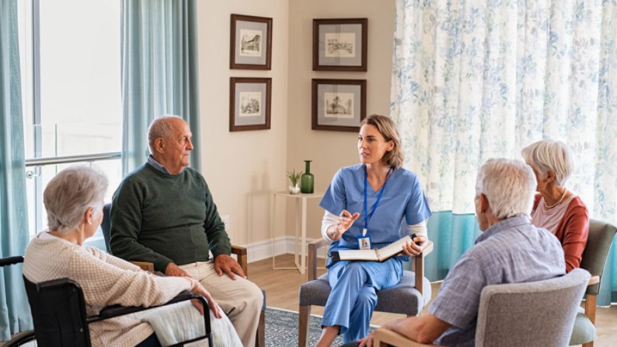 Nurse with elderly patients 
