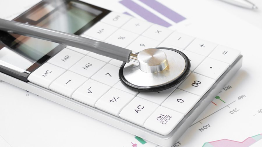 Balance sheet and stethoscope