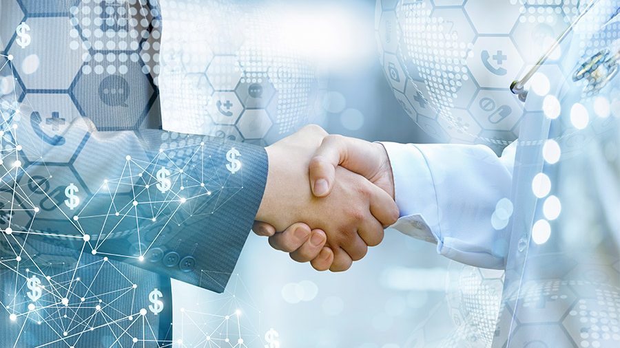 Business man and doctor shaking hands
