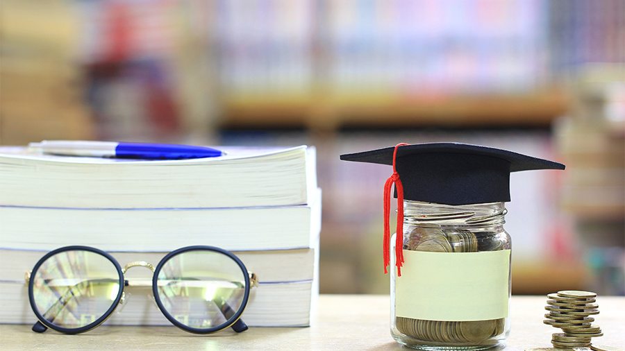 Stack of books and glasses