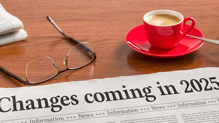 Coffee cup and newspaper