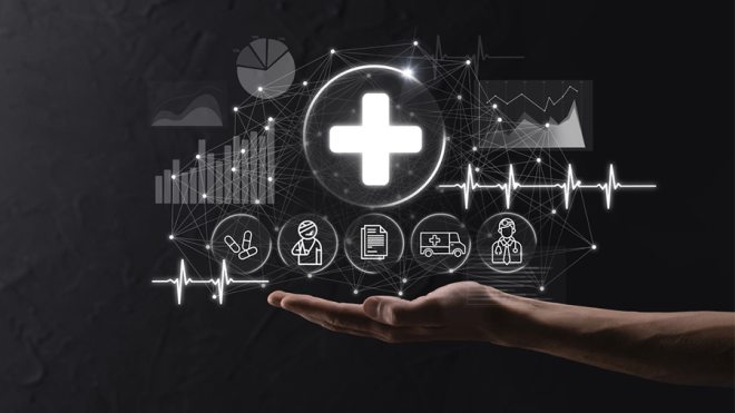 Hand holding medical symbols