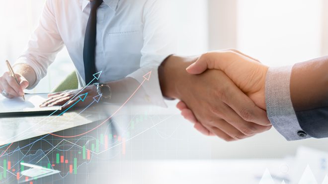 Business consultants shaking hands